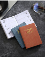 A7 specification 2026 English planner book, mini portable pocket daily schedule book, 64 sheets 128 page thin weekly calendar