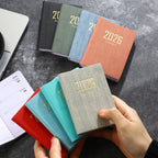 A7 specification 2026 English planner book, mini portable pocket daily schedule book, 64 sheets 128 page thin weekly calendar