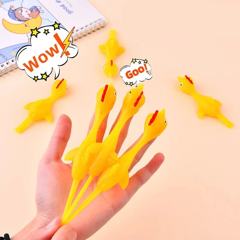 20pcs Novelty Sport Catapulted Ejection Chicken Toy Rubber Prank Flying Toy Slingshot Chicken Finger Toys Turkey Sticky